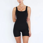 Model wearing onyx black pilot playsuit displaying elegant fit and versatile style