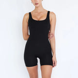 Model wearing onyx black pilot playsuit displaying elegant fit and versatile style